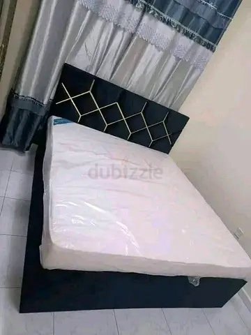 Queen bed frame with mattress (modern upholstered, storage base)