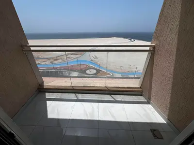 Directly on Ajman Corniche Three-bedroom apartment with a living room First occupancy Sea view 60,000 AED In 4 or 6 installments Excellent direct sea