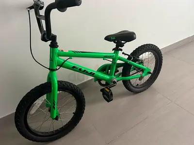 Green Fuji kids bike - 12 inch wheels , for 3/4 year, good condition