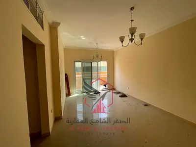 Cheapest two-bedroom apartment with a large balcony, open view, and excellent finishing for rent in Al Qasimia