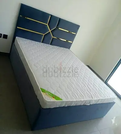 Queen-size upholstered bed with storage and mattress