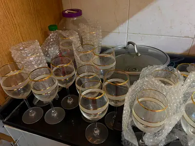 Set of 24 to 30 Gold-Rim Glasses (Used) + Extras