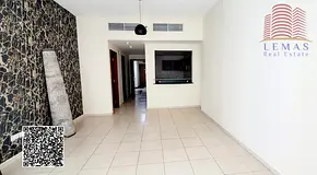 empty 1 bedroom open kitchen with parking available for sale in, Ajman One Towers