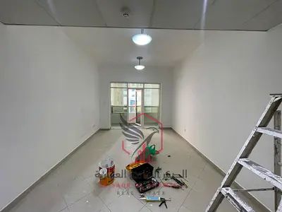 The most beautiful two-bedroom master apartment with a balcony view and a storage room in one of the finest towers in Sharjah
