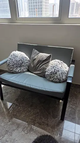 Modern living room sofa with cushions - good condition