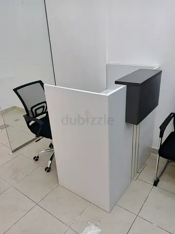 Compact white reception counter