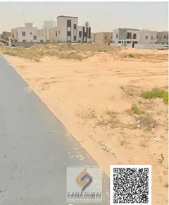 Residential land for sale in Al Zahia, registration fees included