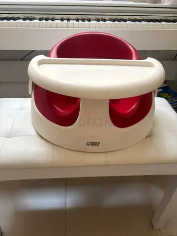 Red and white portable baby booster seat with tray - good condition