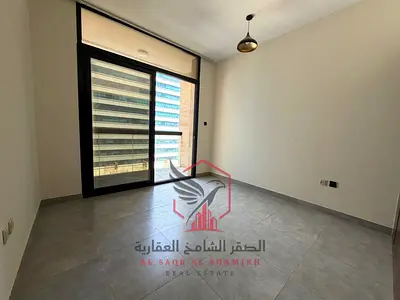 Free parking, larger size, two bedrooms and a living room with two balconies + built-in wardrobes + storage room for rent in Al Khan