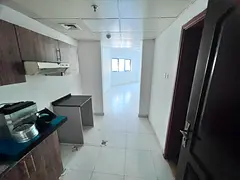 Studio in Falcon Towers Al Rashidiya 2, spacious unit, wardrobes, central AC, great view.