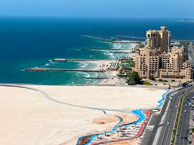 Directly on Ajman Corniche Three-bedroom apartment with a living room Sea view 55,000 AED In 4 or 6 installments Excellent direct sea view 4 bathro