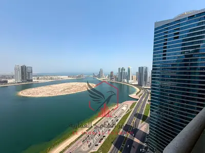 **Asas Tower | 2BR + Maid’s Room | Free A/C | Free Parking | Free Gym & Pool | Spacious | Sea View Balcony | Near Dubai**