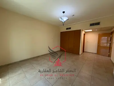 اجمل غرفة وصالة مع تكييف مجاني باركن + جيم ومسبح مجانا سهل المخرج الى دبي للايجار في المجاز 2