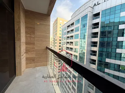 Apartment for annual rent - Al Khan, free parking, second tenant, storage room, spacious areas, open view, balcony, free maintenance, central air