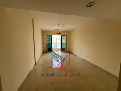 Sea view with a balcony for a two-bedroom apartment with a living room, parking, and security deposit by cheque, located in one of the most beautiful