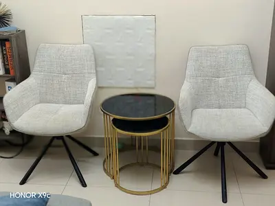 Pair of Modern Upholstered Accent Chairs with Nesting Side Tables