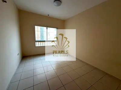 1BR apartment for rent in Al Nuaimiya 2 Ajman, 1 bath, central AC, prime location near Gulfa Bridge and services. AED 23K yearly, 4–6 payments, AED 2K
