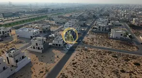 For sale: commercial land in Al-Houshi, corner lot, 12,000 sq ft, freehold for Arabs
