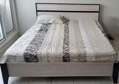 Queen size bed frame with headboard - light wood finish, very good condition. Mattress included 👍