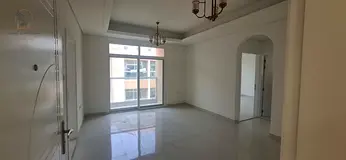 Two bedrooms and a living room, second tenant, with a balcony, built-in wardrobes, and central air c