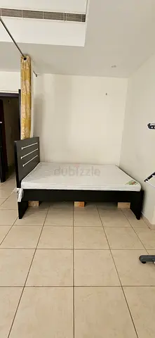 Queen wooden bed frame with mattress - good condition