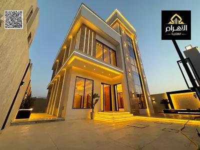 Villa for sale, including registration and ownership fees, near all services, close to Sheikh Mohammed Bin Zayed Road, on a main street, very prime lo