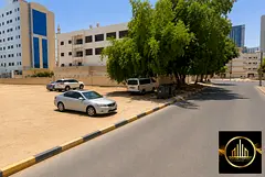 Residential and commercial plot (G+4), opposite a mosque and close to the Ajman Museum; freehold