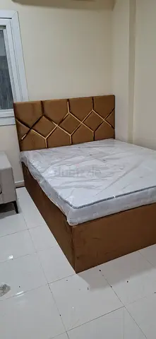 Queen bed frame with upholstered headboard and mattress - brand new
