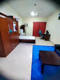 Family big hall room available with balcony and attached washroom in Karama.