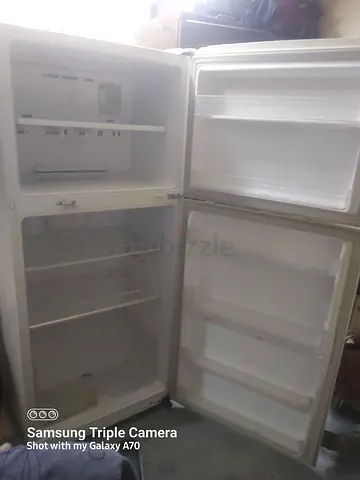 Used double-door refrigerator - good working condition