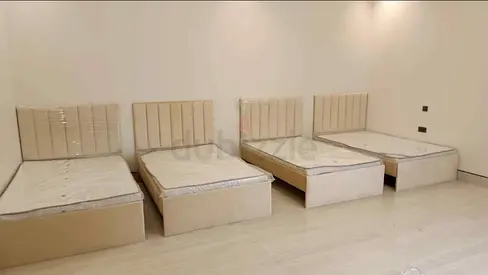 Four single beds with mattresses and upholstered headboards - new