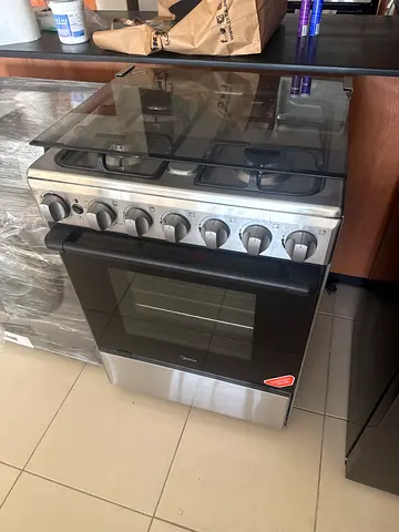 Stainless Steel Gas Cooker with 4 Burners and Oven - Good Condition