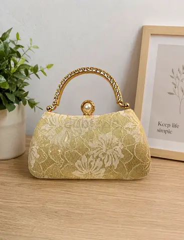Gold floral evening clutch bag with jeweled handle