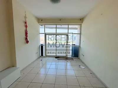 Spacious Unfurnished Studio for Rent | Royal Residence 1 | Dubai Sports City
