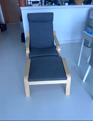 IKEA Poäng armchair with ottoman — birch frame, dark grey cushion