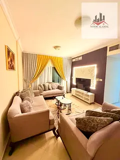 Sharjah, Al Taawun: Super-deluxe furnished apartment. Features a bedroom, living room, kitchen, two 