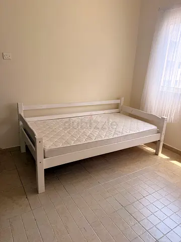 Single white bed