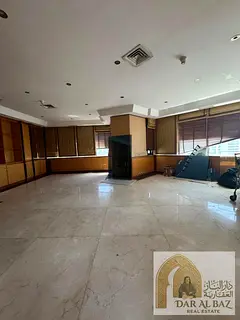 Office for annual rent in Al Majaz 1, consisting of 6 rooms with a large reception area, free air co