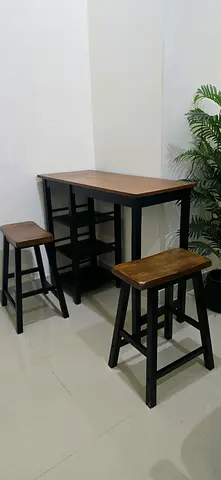 Compact wooden dining table with two matching stools - good condition