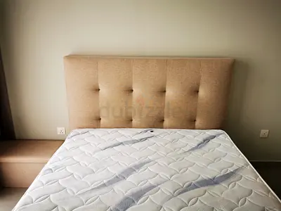 Beige upholstered queen size bed with mattress  - perfect condition