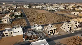 10,000 feet of residential land for sale in Al-Hawshi - Al-Badi suburb, next to Al-Amana Mosque