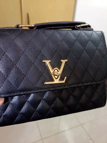 Black quilted leather LV-style shoulder bag, gently used