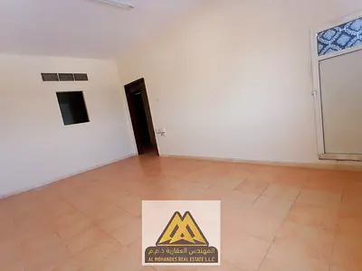 One-bedroom apartment for annual rent in Al Hamidiya 1, Ajman. Balcony, open kitchen, central AC, free maintenance by owner. Prime location close to a