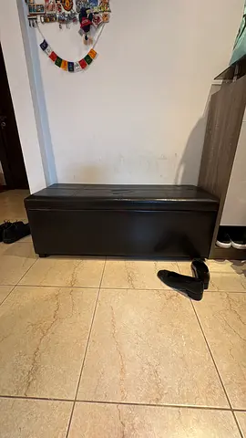 Black faux leather storage bench/ottoman - good condition