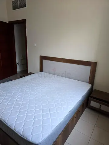 King wooden bed frame with mattress and bedside table - excellent condition like new