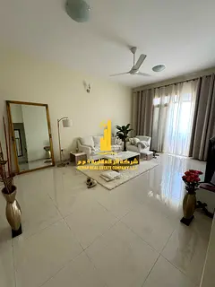 Luxury one-bedroom apartment with a living room and balcony offering an open view. Ajman, Al Rawda 3