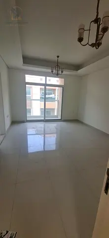 Annual 2BR Hall Golden Opportunity Master BR 2Bath Balcony Central AC Modern Finishing Spacious Layout Easy Access Dubai Sharjah