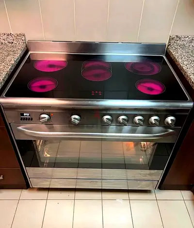 Smeg electric cooker with ceramic Hob and Oven - 5hobs stainless steel body