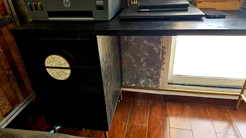 Solid dark wood office desk with attached drawer unit