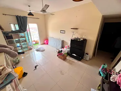 1BR in Al Mowaihat 3, spacious unit, master room, 2 baths, prime location, 29K yearly.